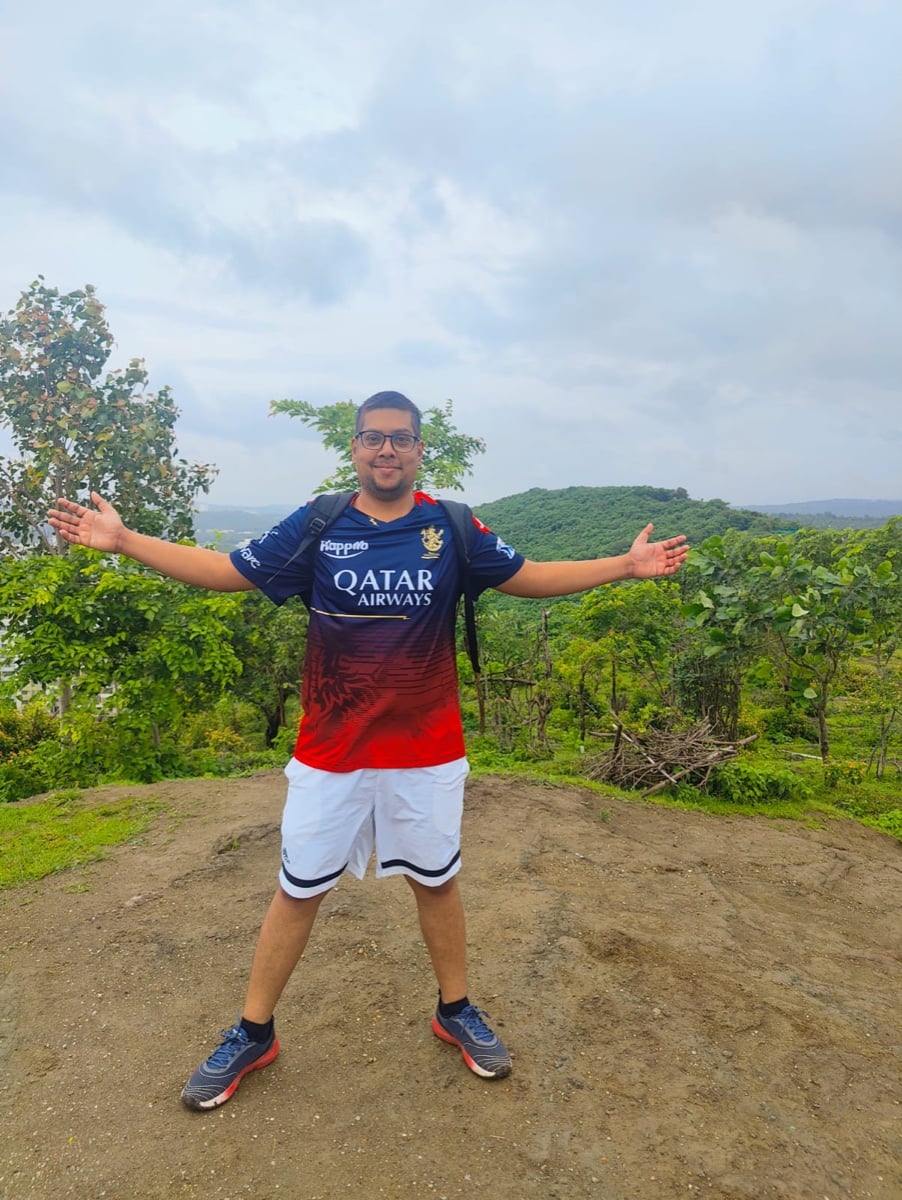 Raj on a hilltop in his RCB jersey